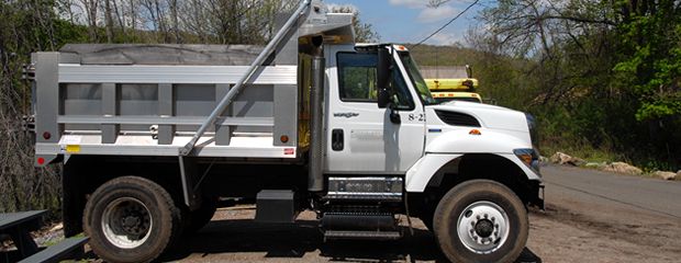 image of compost dump truck